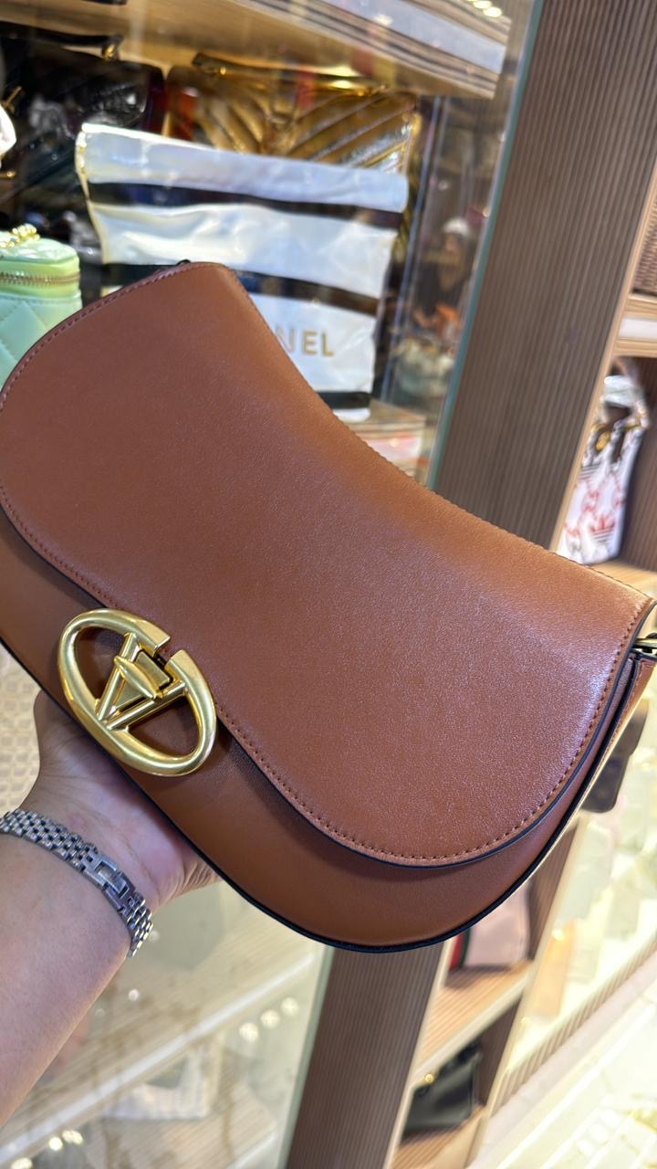 Sac Valentino Garavani besace Ohval en cuir