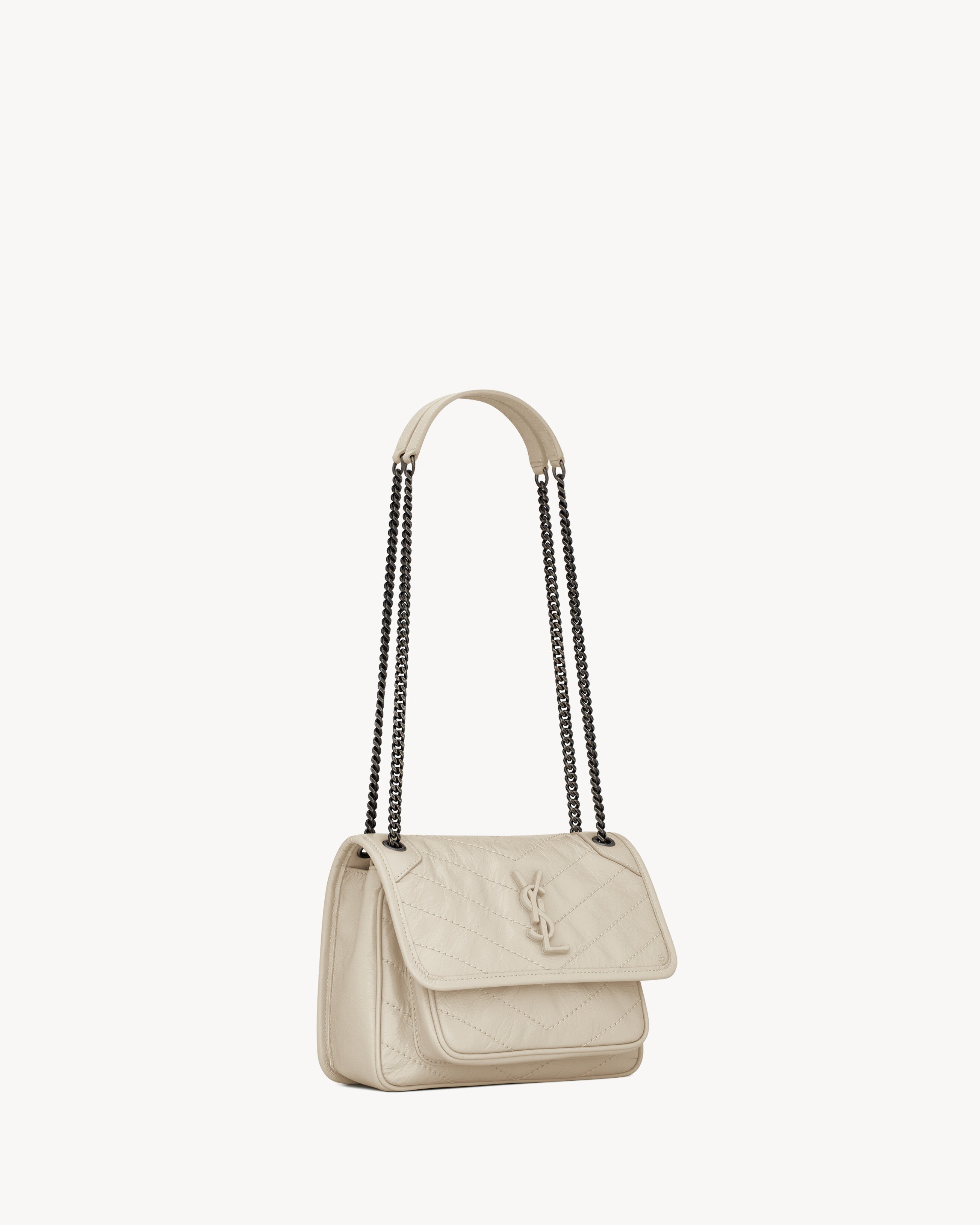 SAC YSL NIKI BABY EN SEMI CUIR 
BLANC VINTAGE
