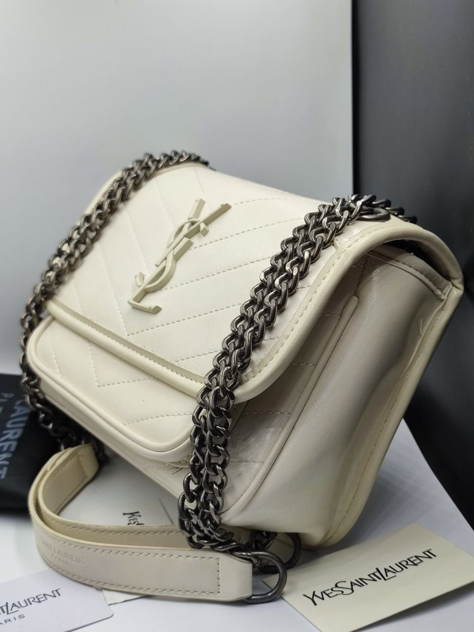 SAC YSL NIKI BABY EN SEMI CUIR 
BLANC VINTAGE