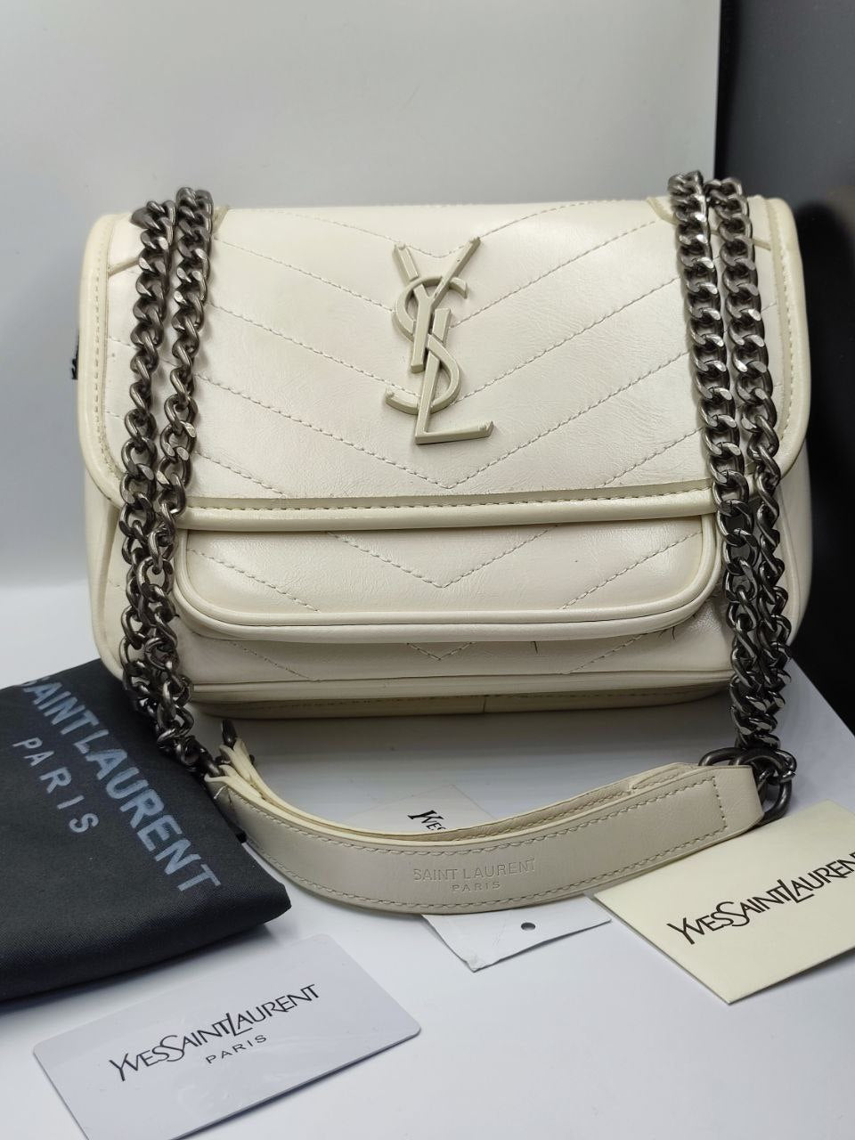 SAC YSL NIKI BABY EN SEMI CUIR 
BLANC VINTAGE
