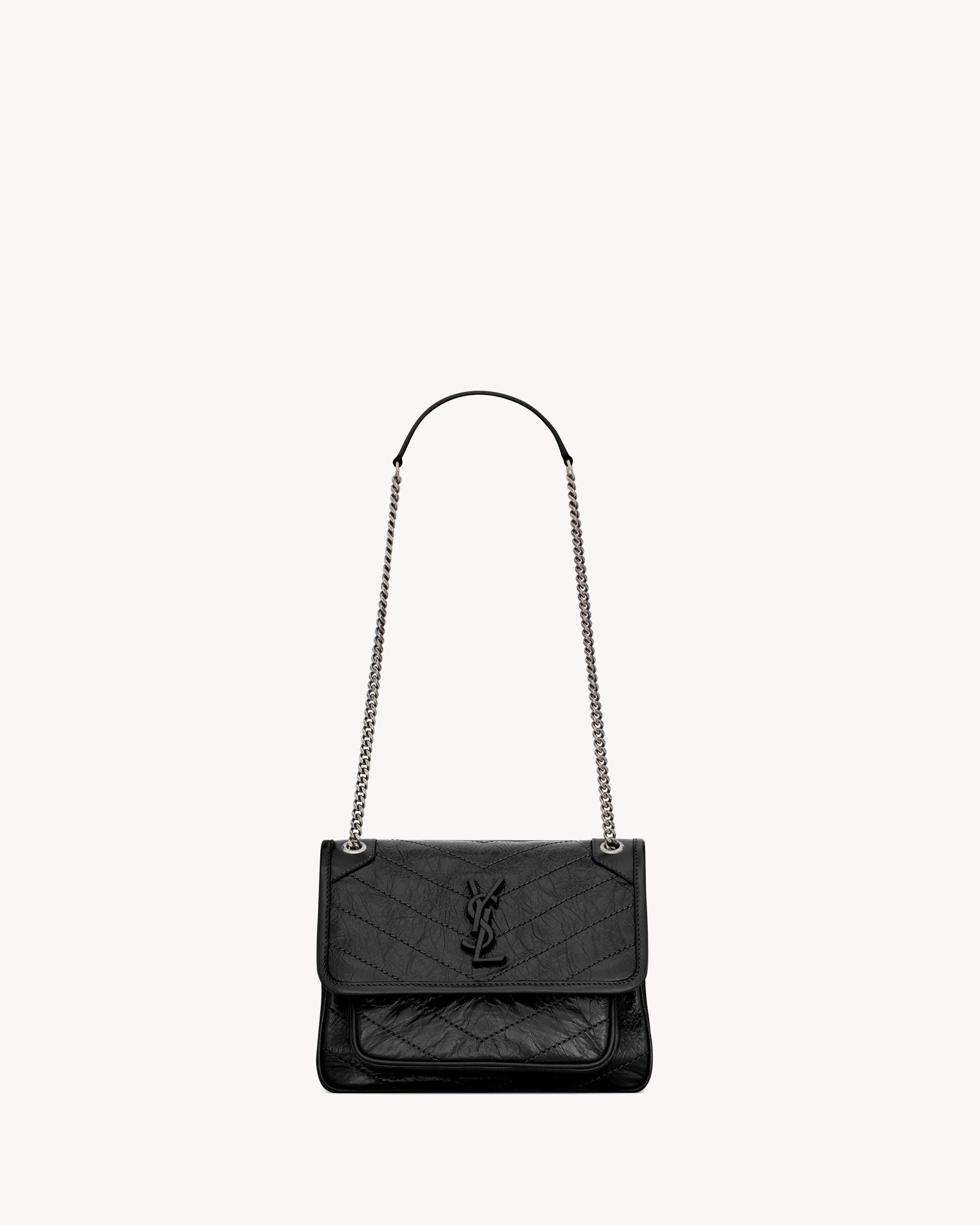 SAC YSL NIKI BABY EN SEMI CUIR VINTAGE NOIR
