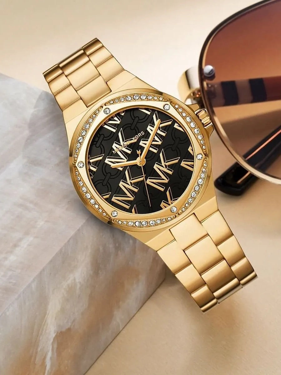 Montre Lennox de Michael Kors à trois aiguilles en acier inoxydable, doré