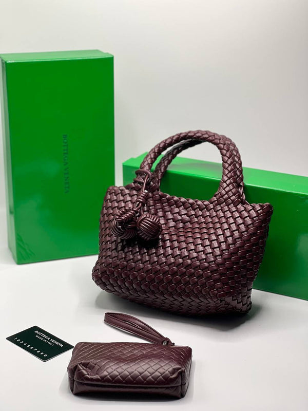 SAC À MAIN BOTTEGA TRESSÉ UNIQUE DE COULEUR BORDEAUX
